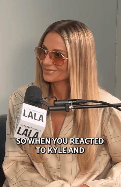 Dorit Kemsley’s Ivory Satin Shirt and Pants Set - Product Image