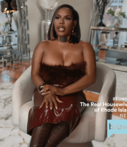 Kelli Ferrell’s Burgundy Strapless Fur Confessional Dress - Product Image